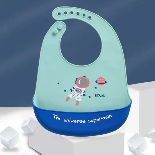 Babero impermeable 3D con bolsillo para comida para niños